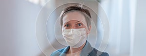 Business woman with protective face mask during Covid 19 pandemics photo