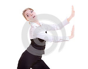 Business woman pushing away invisible obstacles copy-space isolated