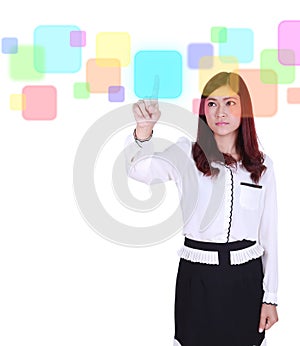 Business woman pushing button on a touch screen