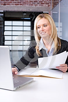 Business woman reading documents