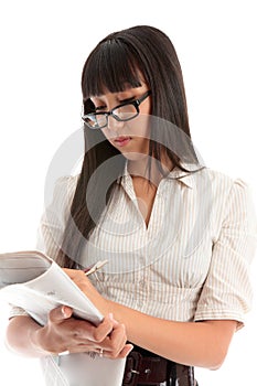 Business woman reading newspaper