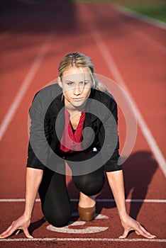 Business woman ready to sprint