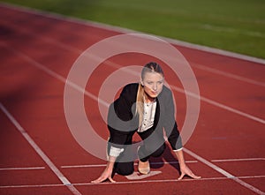 Business woman ready to sprint