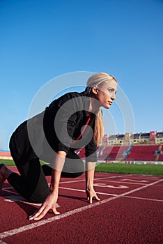 Business woman ready to sprint