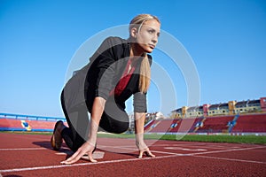 Business woman ready to sprint