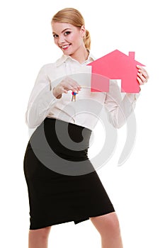 Business woman real estate agent holding red paper house keys