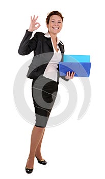 Business woman with reports and ok gesture
