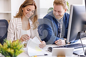 Business woman reviewing and signing contract