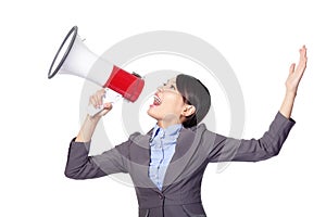 Business woman screaming in megaphone