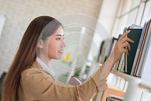 Business woman Searching files and and reading book in the cabinet or books shelves