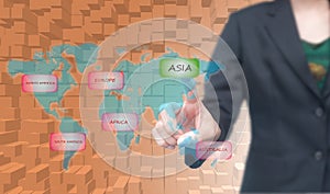 Business woman select Asia icon on worldmap