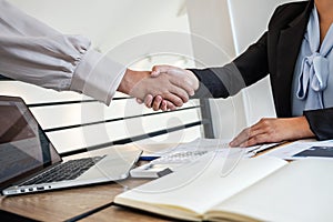 Business woman shaking hands after conversation, Finishing up a collaboration discussing of partner cooperation in investment