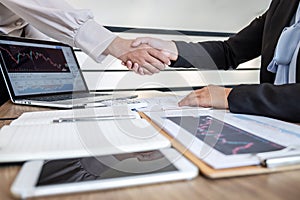 Business woman shaking hands after conversation, Finishing up a collaboration discussing of partner cooperation in investment