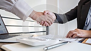 Business woman shaking hands after conversation, Finishing up a collaboration discussing of partner cooperation in investment