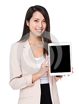 Business woman show with tablet