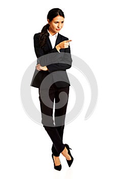 Business woman showing copy space on the right