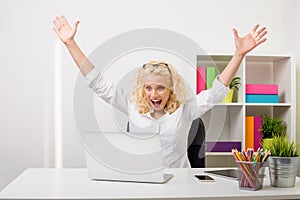 Business woman showing excitement and happiness