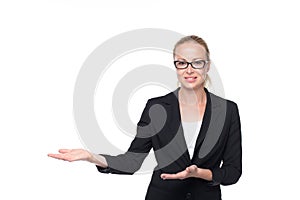 Business woman showing hand sign to side.