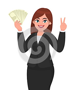Business woman showing, holding bunch of money, cash, dollar, currency, banknotes in hand and gesturing, making victory, V, peace.
