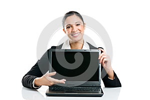 Business woman showing laptop screen