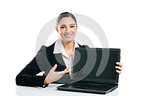 Business woman showing laptop screen