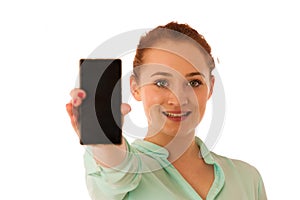 Business woman showing a message on a screen of a smart phone is