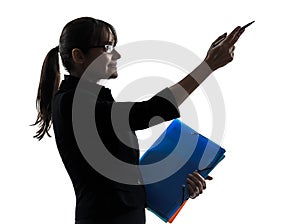 Business woman showing pointing holding folders files silhouet