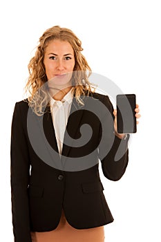 Business woman showing smart phonewith blank display for text or