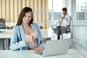 Business Woman Showing thumbs up Gesture. Business People