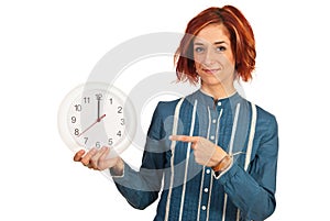 Business woman showing to twelve time