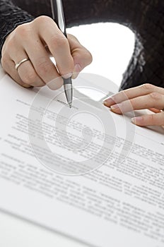 Business woman signing a contract