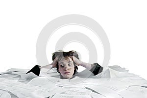 Business woman sinking in an overload of paperwork photo