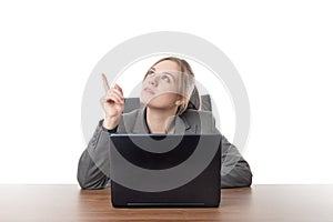 Young business woman sitting a her desk