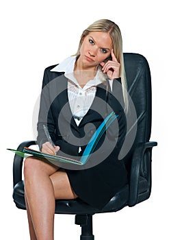 Business woman sitting in office chair photo