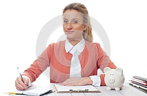 Business woman sitting at the table in office