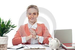 Business woman sitting at the table in office