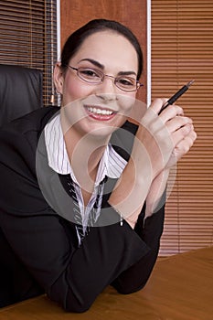 Business woman smile with pen