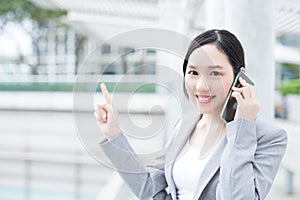 Business woman speak smart phone