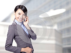 Business woman speaking mobile phone