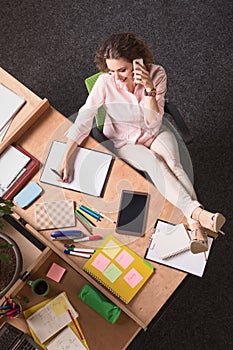 Business woman speaking over phone