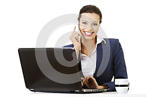 Business woman speaking on phone