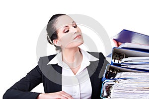 Business woman with stack of binders.