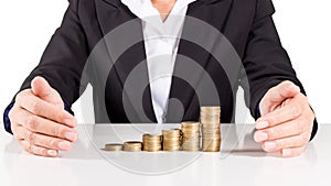Business woman stack gold coin,save money for the future