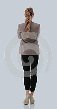 Business woman stand back side with white wall background