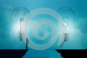 Business woman stand on a cliff with key and dollar signs in light bulbs on a blue background, business concept