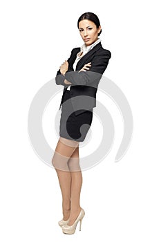 Business woman standing with folded hands