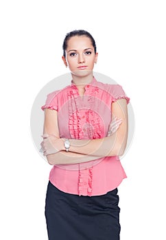 Business woman standing with hands folded agains