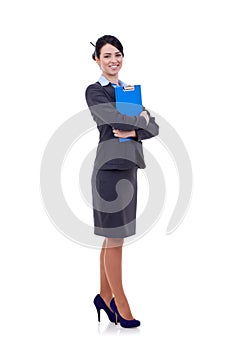 Business woman standing with her clipboard