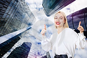 Business woman stands over cityscape background.