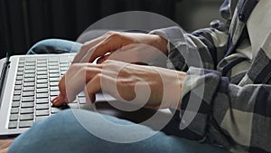 Business woman, student, journalist using a laptop computer. Female hands typing on laptop keyboard